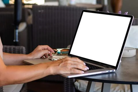 Computer screen blank mockup. hand work using laptop with white background for Stock Photos