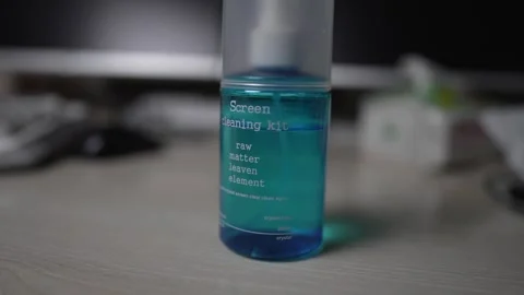 Computer screen cleaning liquid closeup video footage Stock Footage 282387106