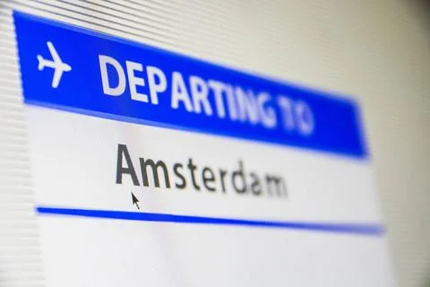 Computer screen close-up of flight to Amsterdam Computer screen close-up o... Stock Photos