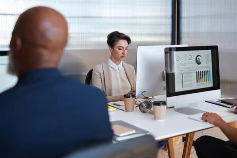 Computer screen, data and finance with business people in office for investment Stock Photos