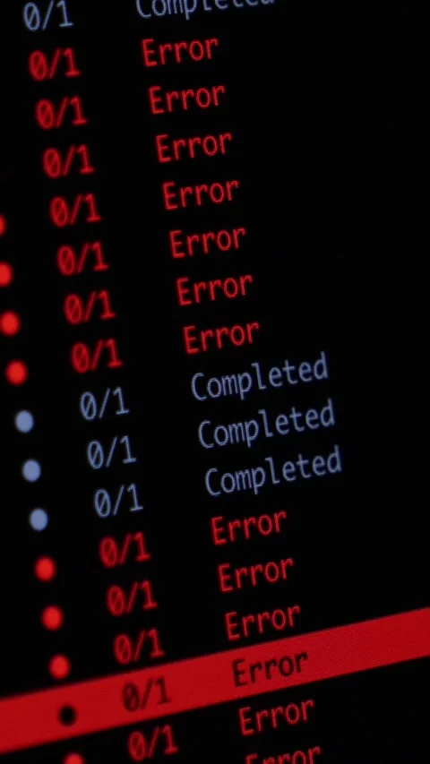 Computer screen displaying a list of software task statuses with red error Stock Footage 346526006