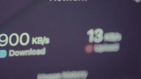 Computer screen displaying the network status, download and upload speeds Stock Footage 327912524