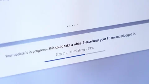 Computer screen displaying a system update installation in progress, showin.. Stock Footage 314389059