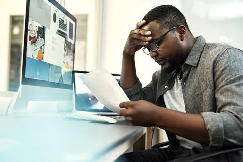 Computer screen, documents and stress with web designer black man in office.. 写真素材