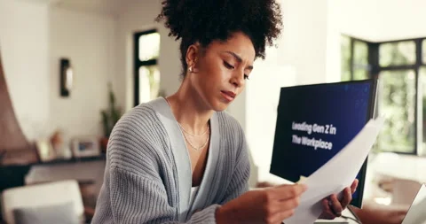 Computer screen, documents and woman in home for research on leading gen z in Vídeos de archivo 312718749
