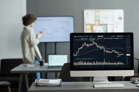 Computer screen with financial statistics illustrated by graph and chart Stock Photos