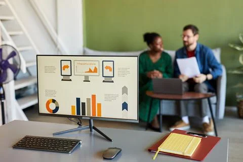 Computer screen with graphic data on workplace of economist or website designer Foto stock