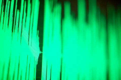 Computer screen with a green wave diagram on display Stock Photos