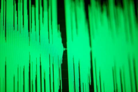 Computer screen with a green wave diagram on display Stock Photos