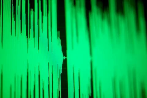 Computer screen with a green wave diagram on display Stock Photos