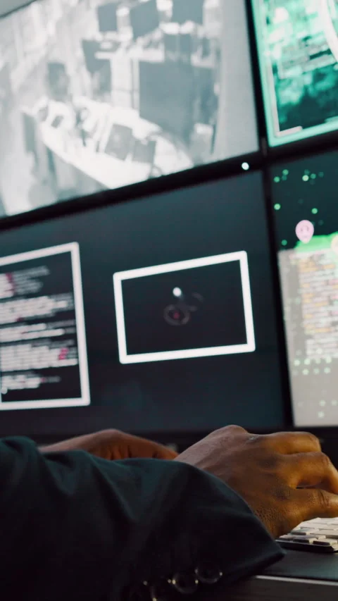 Computer screen, hands and typing with person in CCTV control room for satellite Stock Footage 335275169