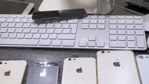 Computer Screen inside look. the broken keyboard, screen and iphone Stock Footage 97811797