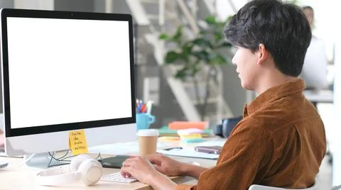 Computer screen mockup, template background, Office man typing computer with Stock Photos
