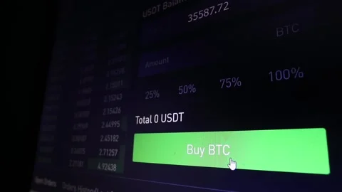 Computer screen with the mouse cursor on the Buy Bitcoin button Stock Footage 169390917