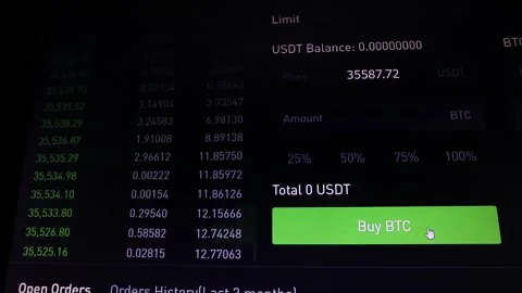 Computer screen with the mouse cursor on the Buy Bitcoin button Stock Footage 220712943