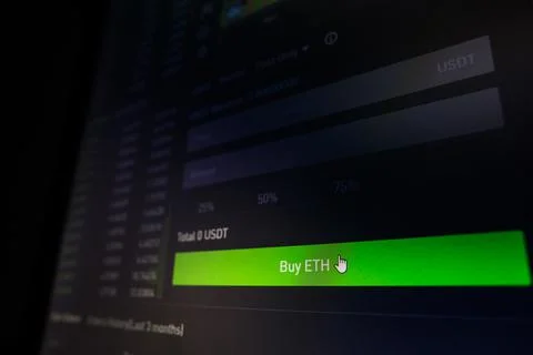 Computer screen with the mouse cursor on the Buy ETH button Foto stock