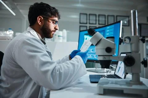 Computer screen, paper and science with man in laboratory for development Stock Photos
