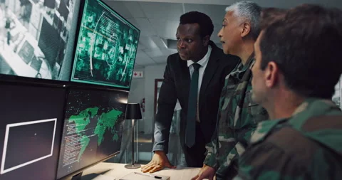 Computer screen, pointing and surveillance with people in CCTV control room for Stock Footage 303557444