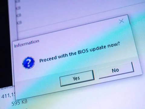 Computer screen questioning proceed with the bios update now Stock Photos