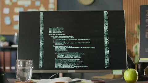 Computer Screen with Running Program Codes in Office Interior Stock Footage 306829152