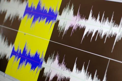 Computer screen showing audio editing software Stock Photos