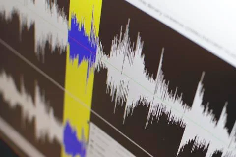 Computer screen showing audio editing software Stock Photos