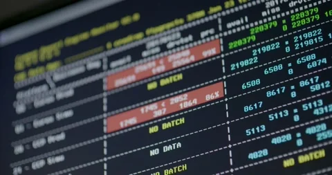 Computer screen shows all kinds of data and numbers, no batch, pan left Stock Footage 237505229