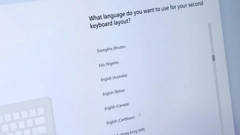 Computer screen shows What language do you want to use for your second keyb.. Stock Footage 314389066