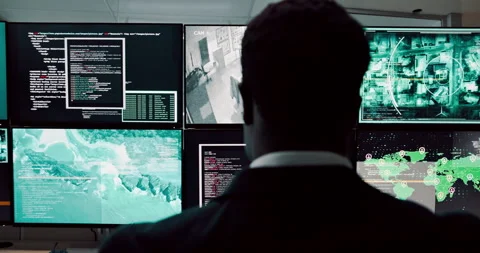 Computer screen, surveillance and video with person in CCTV control room for Video stock 303614617