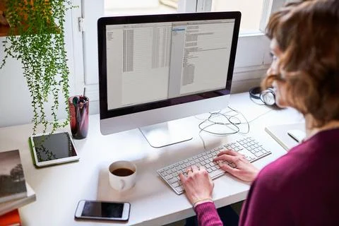 Computer screen, typing and business woman in office with accounting info, .. Stock Photos