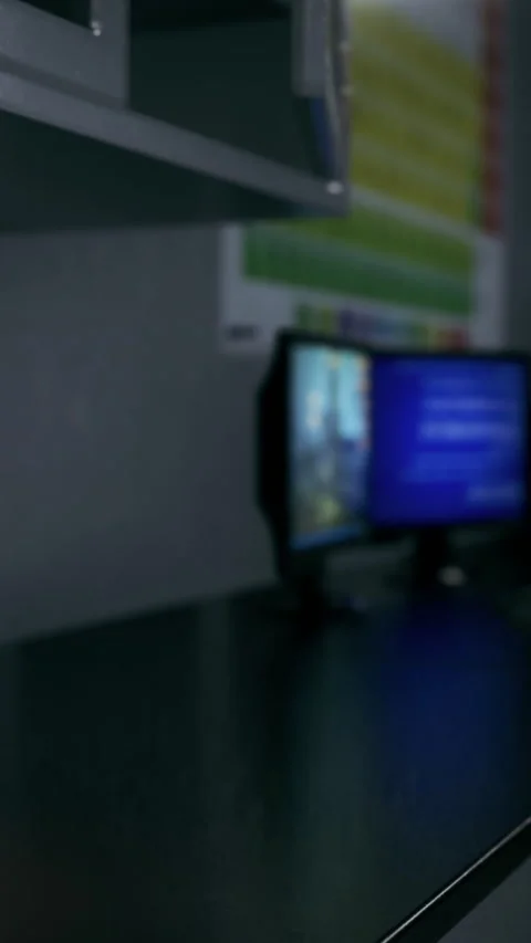 Computer screens in a classroom during a technology class session Stock Footage 338387737
