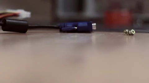 Computer Screws on Table Vídeos de archivo 10714287