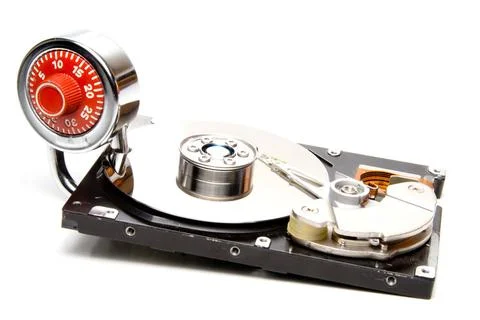 Computer Security A combination padlock and a computer hard drive. Copyrig... 스톡 사진