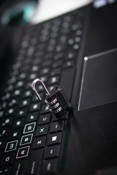 Computer security concept with a closed padlock on the keyboard Stock Photos
