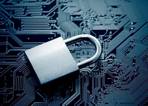 Computer security concept. Padlock on computer circuit board Stock-Fotos