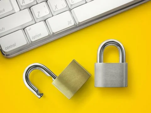 Computer security concept. Unlocked padlock on laptop keyboard. Symbol of saf Foto stock