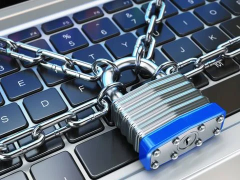 Computer security or safety concept. Laptop keyboard with lock and chain C... Stock Photos