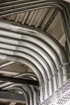 Computer server farm piping used to organize Cat 5 cables and power cables in a Stock Photos
