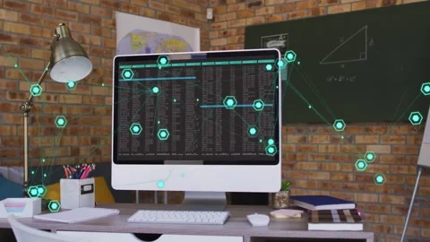 Computer showing terminal data and starting teal nodes linking desk to Stock Footage 333965436