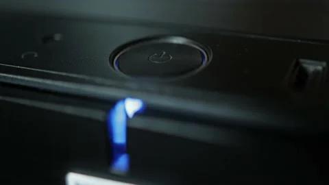 Computer shutdown power button with blue indicator. Modern technologies, macro Stock Footage 158091634