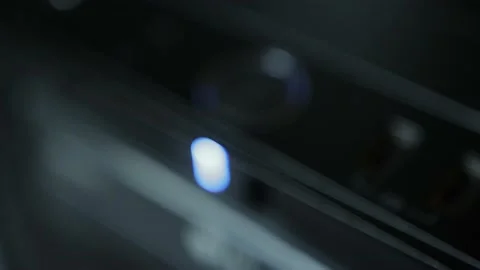 Computer shutdown power button with blue indicator. Modern technologies, macro Stock Footage 158379670