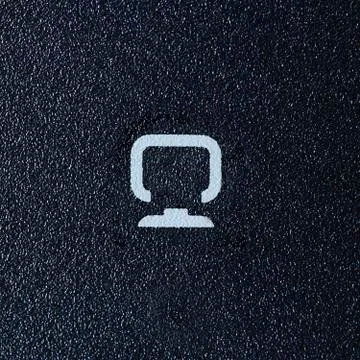 Computer sign on dark Plastic background Stock Photos