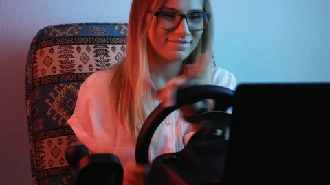 Computer simulation. Concenr young gamer is expressing excitement while enjoy Stock-Footage 113546526