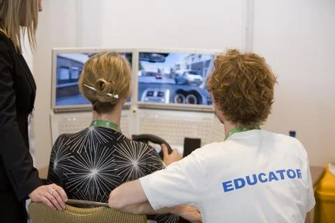A computer simulation driving program being used to show drivers how to drive Foto stock