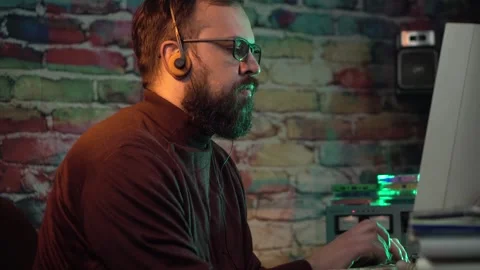 Computer Software Programmer From 1990's Working on Desktop PC Listening Music Stock Footage 306345941