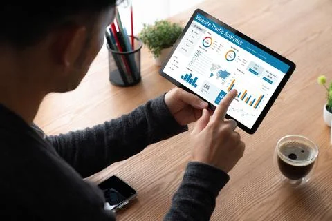 Computer software for website traffic analytics data on computer screen snugly Stock Photos
