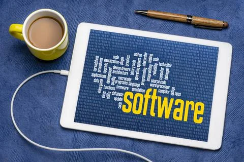 Computer software word cloud on tablet Stock Photos