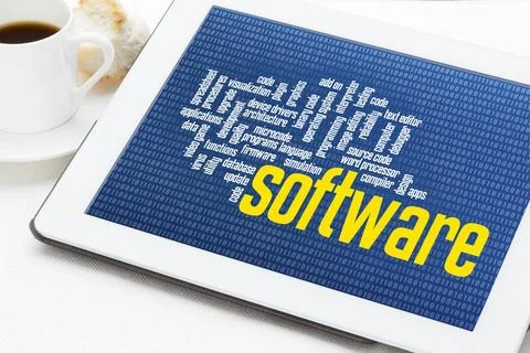 Computer software word cloud on tablet computer software word cloud on zer... Foto stock