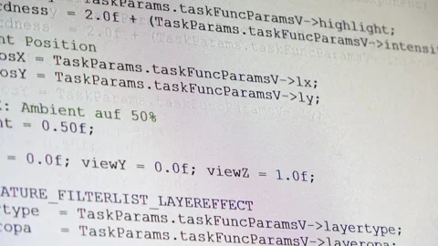 Computer source code scrolling on a white monitor screen Stock Footage 323478509