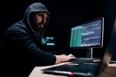 Computer specialist doing cyber attack Stock Photos